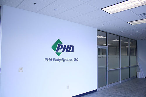 Commercial facility entrance Image of PHA Body Systems' commercial facility entrance.