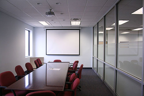 This high tech ergonomic conference room is an incubator for the next great idea Our commercial interior renovation for PHA Body Systems' includes this modern conference room.