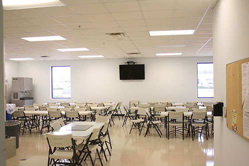 We can create a refreshing cafeteria for employees to refuel This image shows the refreshing cafeteria Fox Building Company created for PHA Body Systems.