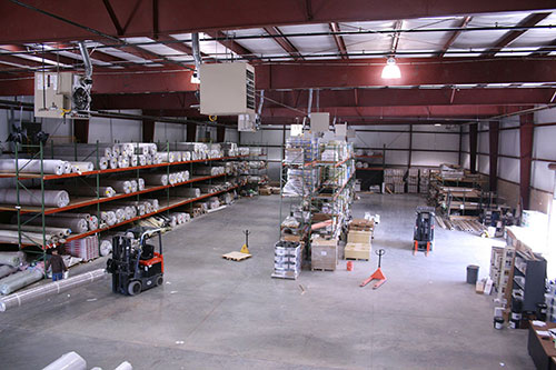 This warehouse renovation was designed for efficiency. Image of Cabinet Resources' commercial interior renovation. This warehouse is designed for efficiency.