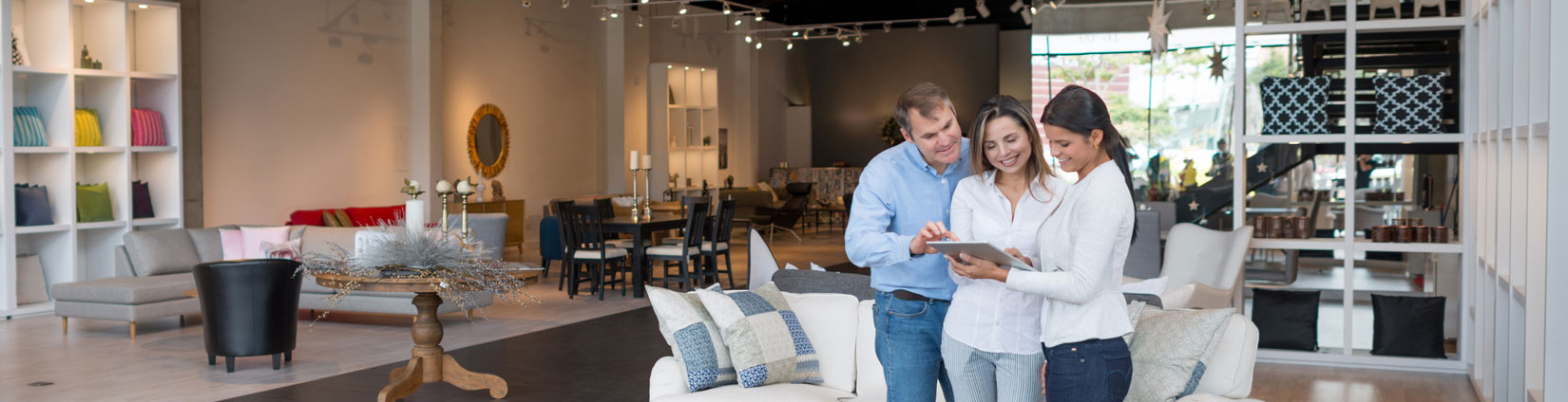 Image of people planning a commercial interior renovation for a retail store.